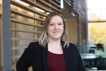 Headshot of Dr. Sarah Dick in the School of Medicine building