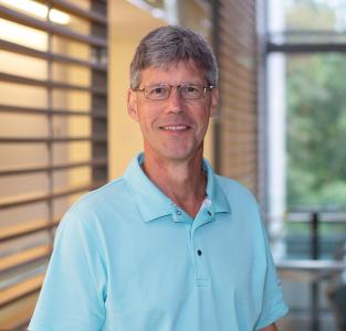 Headshot of Dr. James Reynolds in School of Medicine Building